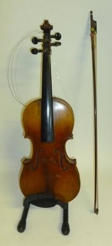 Lot 1088 - A 19th Century German Violin, no label, with a 365mm two piece back, ebony tuning pegs, with a bow