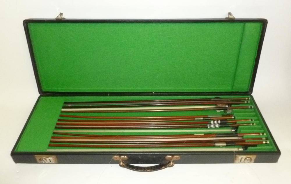 Lot 1112 - A Bow Case Containing Eleven Bows, including two interesting 19th century German violin bows, cello