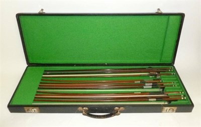 Lot 1112A - A Bow Case Containing Eleven Bows, including two interesting 19th century German violin bows, cello