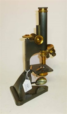 Lot 1021 - A Grey Enamelled Monocular Compound Microscope by R & J Beck, London, number 24376, with rack &...