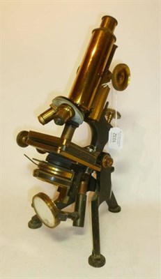 Lot 1032 - A Lacquered Brass and Black Enamelled Monocular Compound Microscope by W.Watson & Sons, London,...