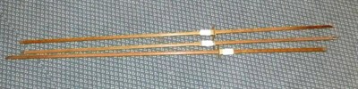 Lot 1047 - Three 4ft Beech Bung Rods, with brass sliders, one stamped Customs & Excise DF49 G2