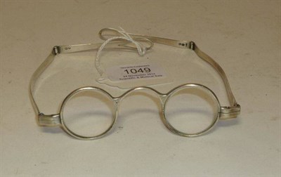 Lot 1049 - A Pair of George III Silver Framed Spectacles, hallmarks for London 1807, makers mark 'D.C',...