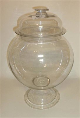 Lot 1055 - A Rare 18th Century English Glass Leech Jar and Cover, of globular form, raised on a flared...