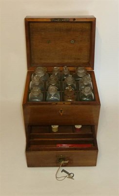 Lot 1057 - A 19th Century Mahogany Apothecary's Box, containing twelve compartmentalised freeblown glass...