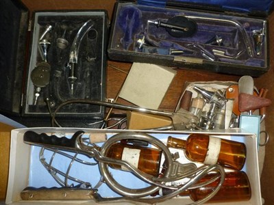 Lot 1063 - A Collection of Medical Instruments, including a leather three drawer chest of medical items,...