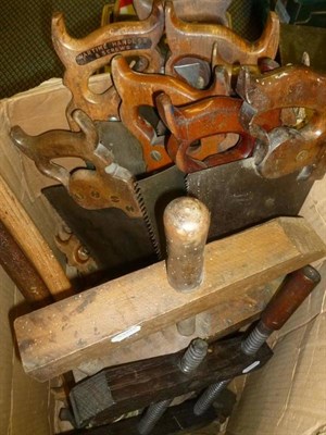 Lot 1077 - A Collection of Woodworking Saws, two adzes and two wooden clamps