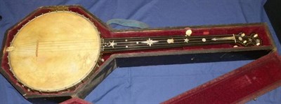 Lot 1136 - A Five String Zither Banjo by J.H.Williamson, Lincoln, with 28cm head, open back, chrome...