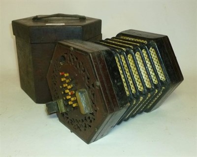 Lot 1152 - A Lachenal & Co Forty Eight Key English System Hexagonal Concertina, with fretwork mahogany...