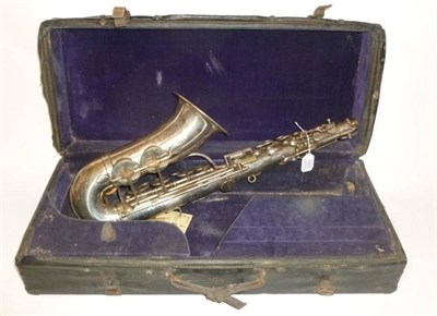 Lot 1161 - A Silver Plated Alto Saxophone by John Grey & Sons, London, with foliate engraving to bell,...