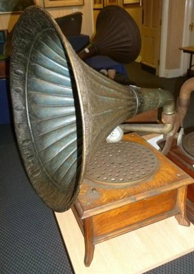 Lot 1175 - An Oak Cased Horn Gramophone, with pierced turntable, Gilbert 'Tone Reflector' mother of pearl...