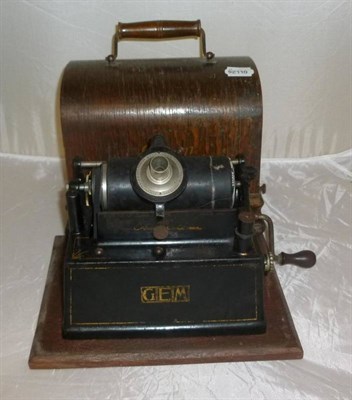 Lot 1178 - Two Oak Cased Edison Phonographs:- Gem No.G147247, with domed lid, winding handle and tinplate...