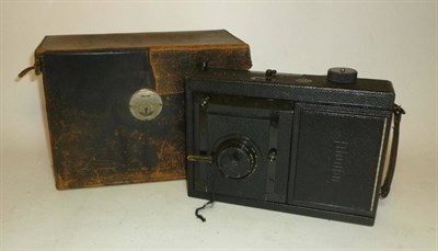 Lot 1188 - A Goltz & Breutmann 'Mentor' Folding Reflex Camera, with black leather covered body, Zeiss...