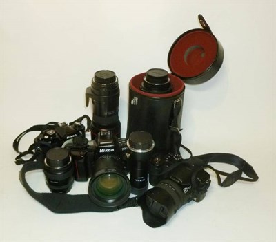 Lot 1193 - Cameras and Accessories, including Nikon FM2 and F90 cameras with AF Nikkor f3.5-4.5/28-70mm...