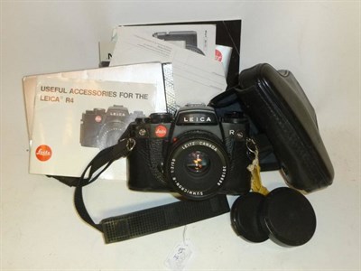 Lot 1197 - A Black Leica R4 Camera No.1558643, with Summicron-R f2/50mm lens, leather case and manuals