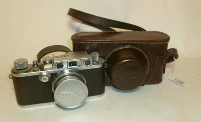 Lot 1200 - A Leica IIIb Camera No.242471, circa 1937/38, in chrome, with collapsible screw mount Summicron...