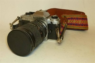 Lot 1205 - A Nikon FG 35mm Camera, in chrome, with Tamron SP f3.5-4.2/28-80mm lens, in a nylon bag; An Air...