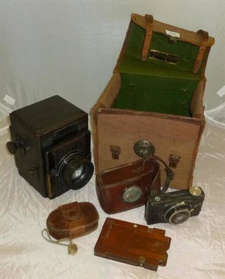 Lot 1216 - A Thornton Pickard Special Ruby Reflex Camera, with black leather covered body, Taylor-Hobson 5...