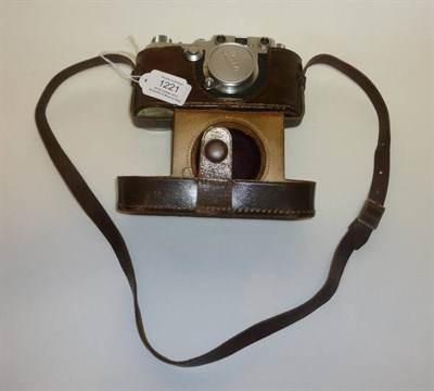 Lot 1221 - A Leica IIIc Chrome Camera No.504471, circa 1950, with sharkskin grip, collapsible chrome Elmar...