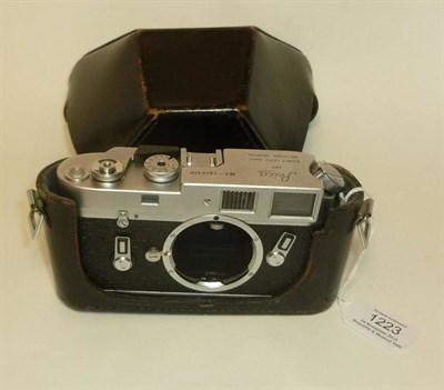 Lot 1223 - A Leica M4 Chrome Camera Body No.1214310, circa 1968-69, in a stitched leather case