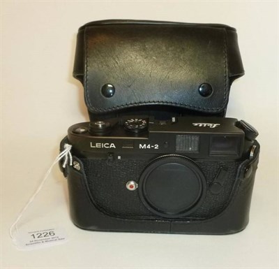 Lot 1226 - A Leica M4-2 Black Camera Body No.1525729, circa 1978-80, with aperture cover, in a leather case