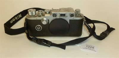 Lot 1228 - A Leica IIIc Wartime Chrome Camera Body No.379676, circa 1941-42, with aperture cover