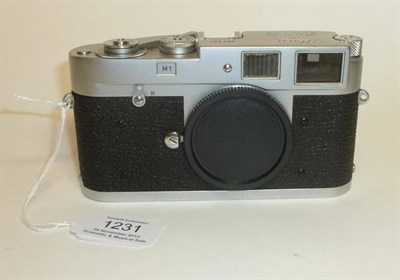 Lot 1231 - A Leica M1 Chrome Camera Body No.967287, circa 1959, with aperture cover