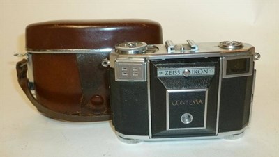 Lot 1235 - A Zeiss Ikon Contessa 35 (533/24) Folding Camera, in chrome, with Tessar f2.8/45mm lens, in the...