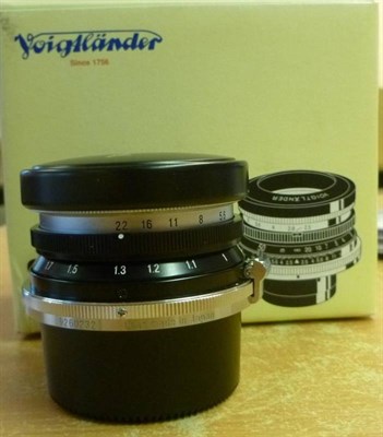 Lot 1240 - A Boxed Voightlander S Skopar 50mm F2.5 Lens, with black enamel finish, as new with packaging...