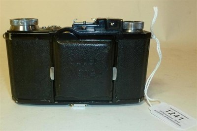 Lot 1241 - A Zeiss Super Nettel (536/24) Folding Bellows Camera, with black enamel and leather covered...