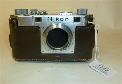 Lot 1242 - A Nikon S Chrome Rangefinder Camera No.6126189, with Nikkor-Q f3.5/135mm lens, in a part...