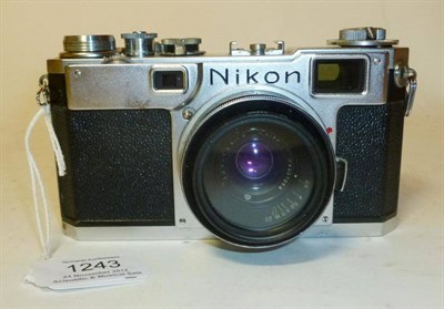 Lot 1243 - A Nikon S2 Rangefinder Camera No.6185616, in chrome with black dials, with Jupiter-12 f2.8/35mm...