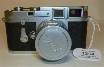 Lot 1244 - A Leica Chrome M3 Rangefinder Camera No.755820, circa 1955, with double stroke advance,...