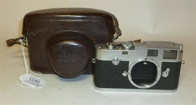 Lot 1246 - A Leica Chrome M2 Rangefinder Camera No.936079, circa 1958, with button rewind, in a stitched...