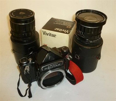 Lot 1250 - An Asahi Pentax 6x7 Medium Format SLR Camera No.4135990, with black enamelled body, two cased...