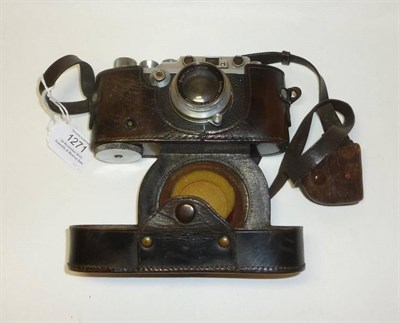 Lot 1271 - A Leica III Camera No.234592, circa 1936-37, in chrome, with Summar f2/50mm lens No.314668, in...