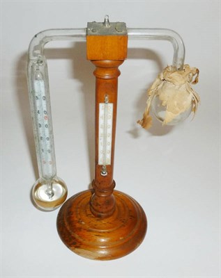 Lot 1004 - A 19th Century John Daniell Type Hygrometer, with boxwood stand, glass bulbs and thermometers,...
