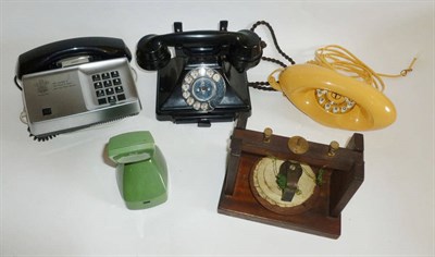 Lot 1005 - Thirteen Vintage Telephones, including an early wooden Gallows Model telephone, a black...