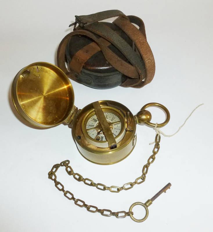 Lot 1014 - A 19th Century Brass Watchman's Clock, the circular case with hinged lid opening to reveal a...