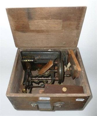 Lot 1019 - A Small Victorian Cast Iron Sewing Machine by P. Frank, Liverpool, in black with gilt...