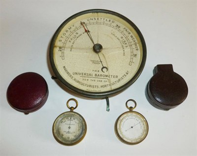 Lot 1020 - Two Compensated Pocket Barometers, in gilt metal pocket watch style cases, with silvered dials, one
