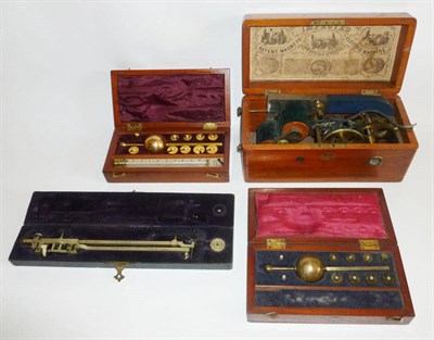 Lot 1021 - A 19th Century Mahogany Cased 'Improved Patent Magneto Electric Machine', with serpentine brass...