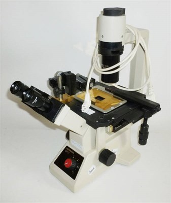 Lot 1029 - An Olympus CK2 Inverted Microscope, with grey enamel finish, mechanical stage,...