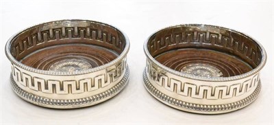 Lot 418 - A Pair of George III Silver Wine Coasters, mark's very worn, circa 1780, each circular and...