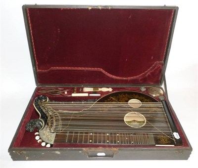 Lot 1087 - A 19th Century German Zither or Table Harp by Joh.Haslwanter, Munich, the rosewood body with...