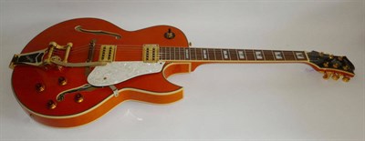 Lot 1098 - A New Orleans Jazz Blues Style Semi Acoustic Guitar by Shine, model SHC-909 TO, finished in orange