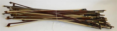 Lot 1117 - A Bundle of Thirty Violin and Viola Bows, with ebony and ivory frogs etc