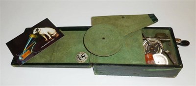 Lot 1178 - A Miniature French 'Mignonphone' Portable Gramophone, in brown leather covered case, with...