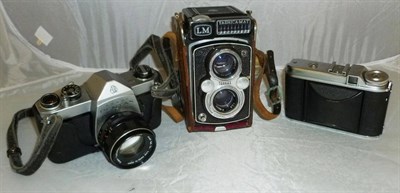 Lot 1205 - A Collection of Cameras and Accessories, including a Yashica-Mat LM in leather case, Pentax SP...