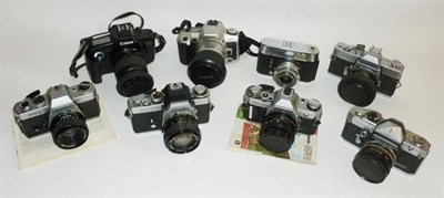 Lot 1212 - A Collection of 35mm Cameras and Lenses, including Olympus OM-10 with 28mm, 50mm and 135mm...